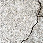 cracked concrete in basement floor