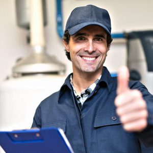 Toronto plumber giving a thumbs up after performing work on a home